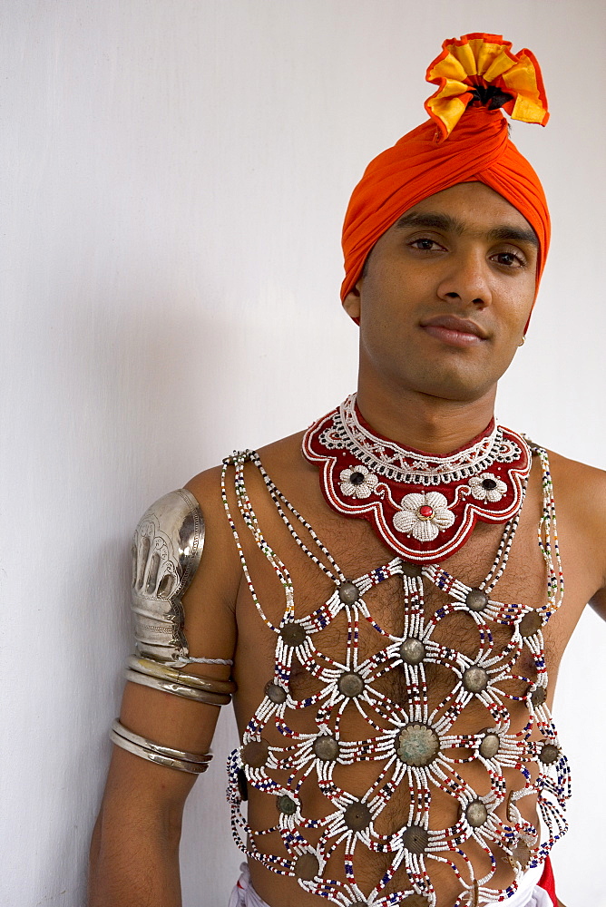 Portrait of a Kandyan dancer in costume, Kandy, Sri Lanka, Asia