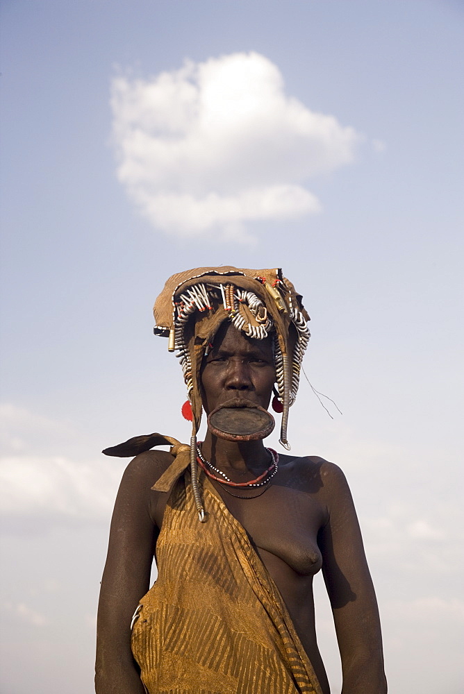 Mursi woman with clay lip plate, Mursi Hills, Mago National Park, Lower Omo Valley, Ethiopia, Africa