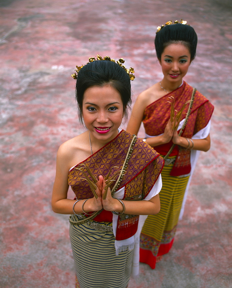 Portrait of two women in traditional Thai costume, Chiang Mai, Thailand, Southeast Asia, Asia