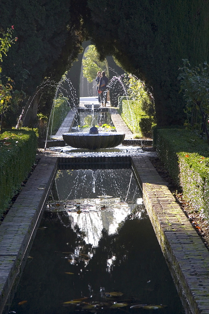 Water channel and fountain in the gardens of the Generalife, Alhambra, UNESCO World Heritage Site, Granada, Andalucia, Spain, Europe