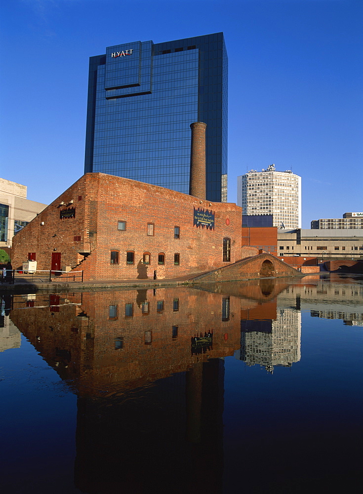 Architectural contrast between the Glass Works and the Hyatt Hotel behind, from the Gas Street Canal Basin, Birmingham, West Midlands, England, United Kingdom, Europe