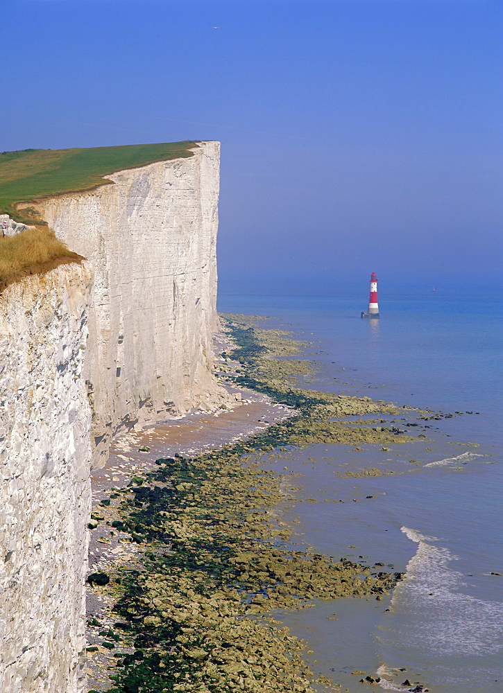 The lighthouse and chalk cliffs of Beachy Head from the South Downs Way, East Sussex, England, UK, Europe