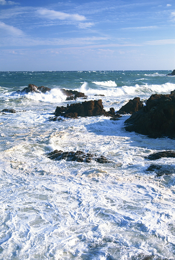 Waves breaking on the rocks along the Corniche D'Esterel on the Cote d'Azur, in the Alpes-Maritimes, Provence, France, Mediterranean, Europe