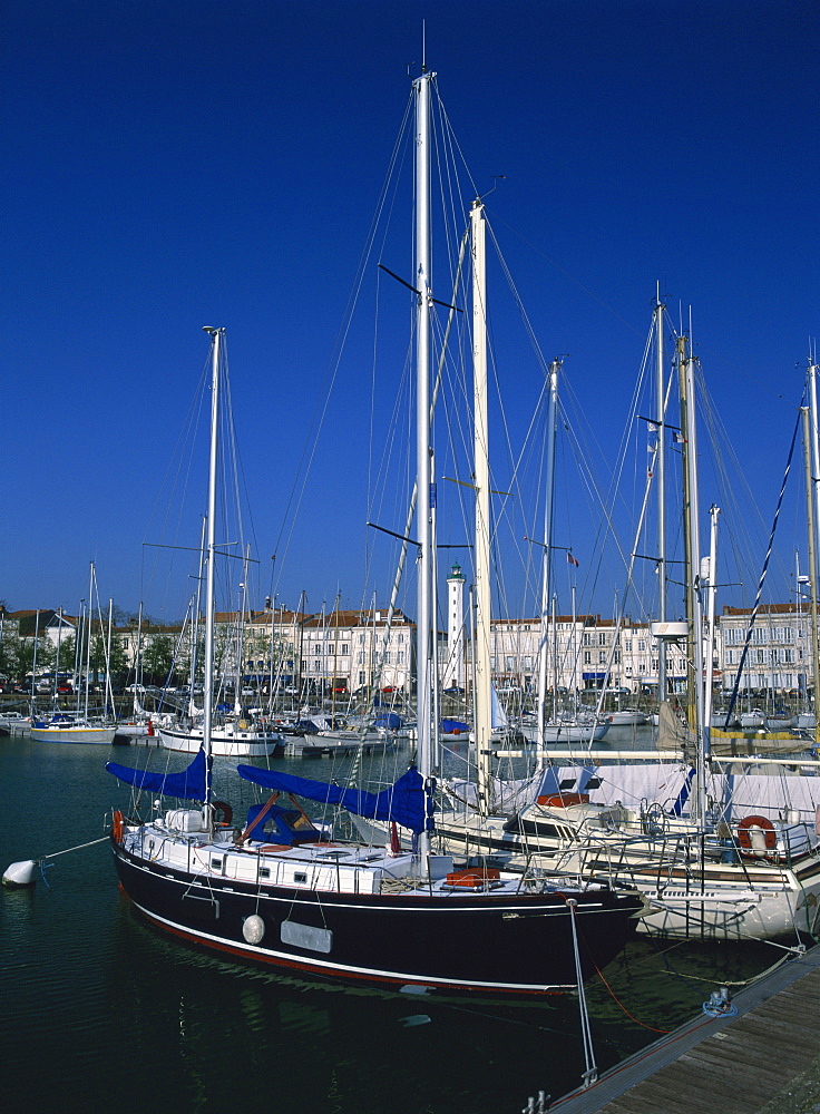 Boats in harbour in the Vieux Port, at La Rochelle in Charente-Maritime, in Poitou Charentes, France, Europe