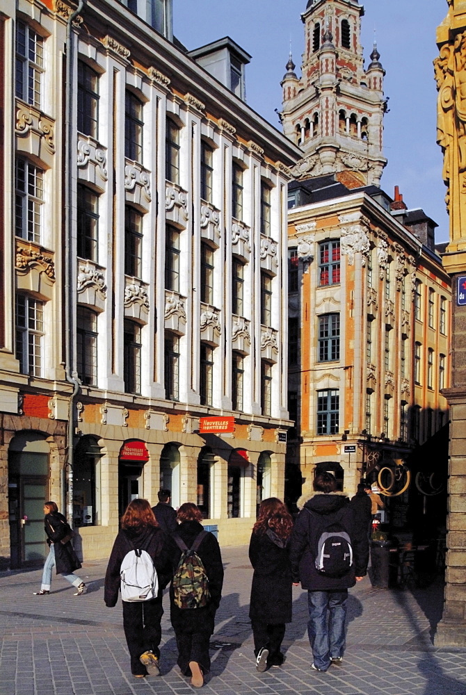 Tourists walking in the Grand Place (Place du General de Gaulle), Lille, Flanders, Nord, France, Europe