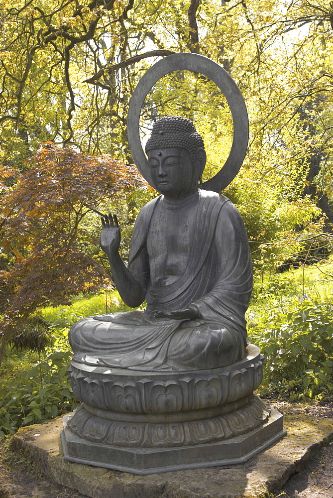 Buddha statue, Batsford Arboretum, Batsford Hall, Moreton in the Marsh, the Cotswolds, Gloucestershire, England, United Kingdom, Europe