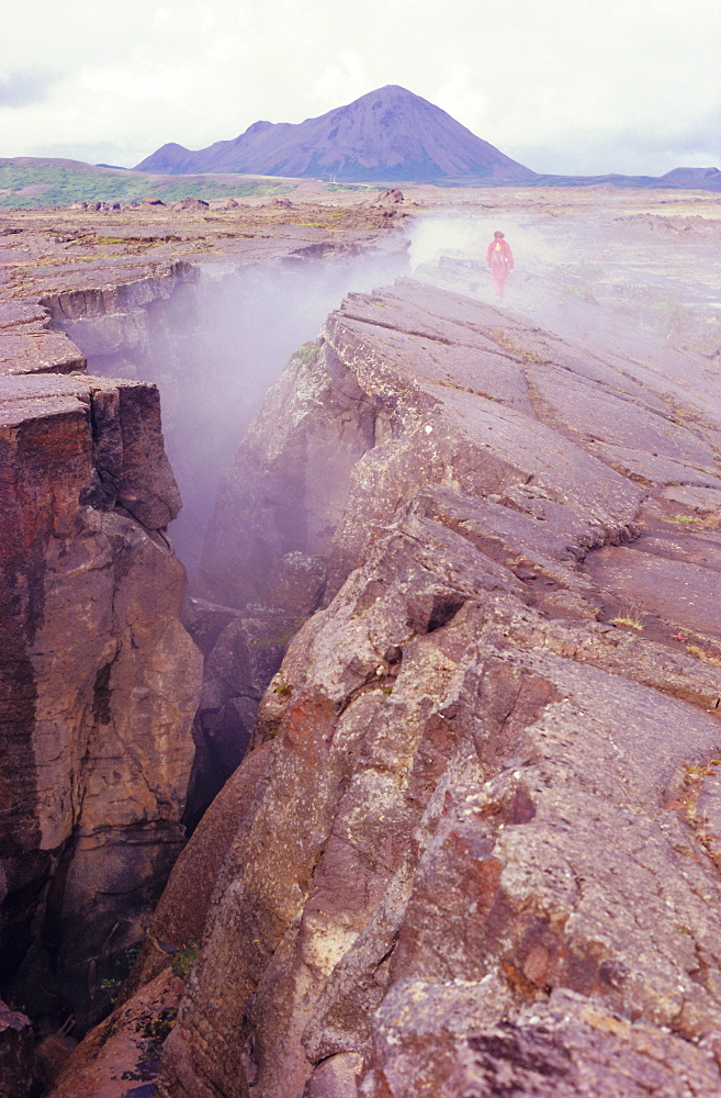 Mygrata Grotogya rift fissure along divergent plate boundary with geothermal steam, North East Iceland