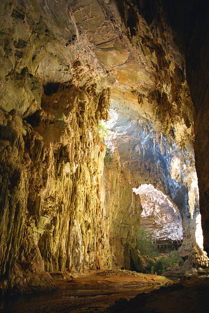 Interior of the Gruta do Janelao, a limestone cave passage 100m high, lit through roof window, at Peruacu in Minas Gerais state, Brazil, South America