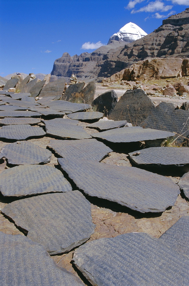 Buddhist prayer stones at sky burial site above Tarboche in Lhu Chu canyon, beneath sacred mountain, on kora route, Mount Kailas (Kailash), Tibet, China, Asia