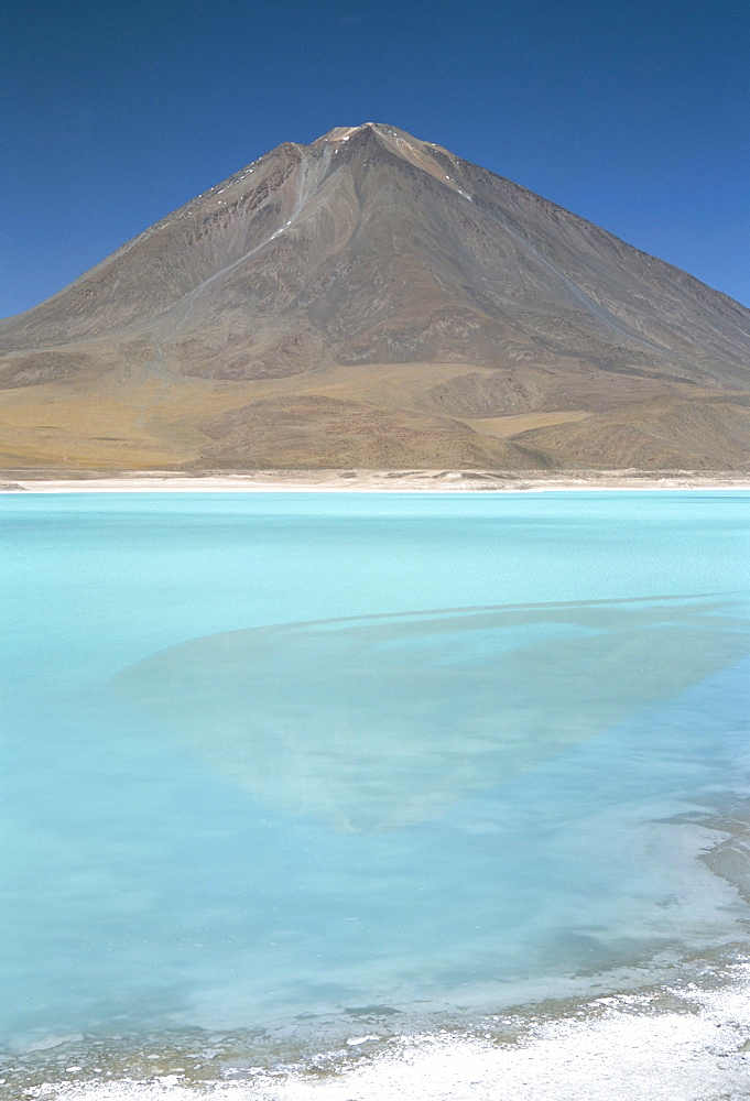 Laguna Verde with mineral flat margin and Volcan Licancabur, 5960m, Southwest Highlands, Bolivia, South America