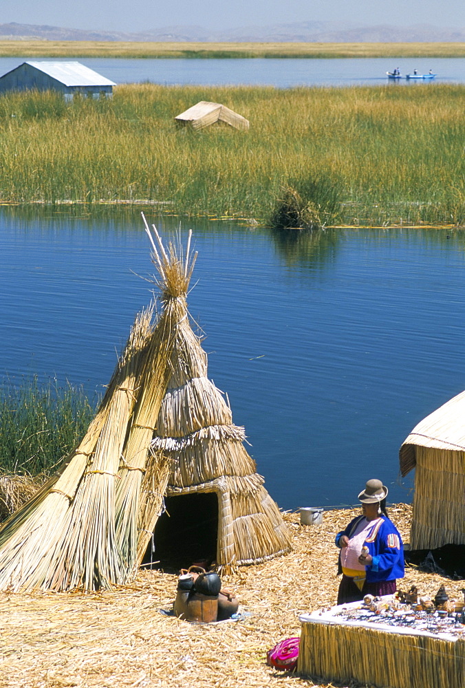 Uros (Urus) village on floating island, Islas Flotantas, reed islands, Lake Titicaca, Peru, South America