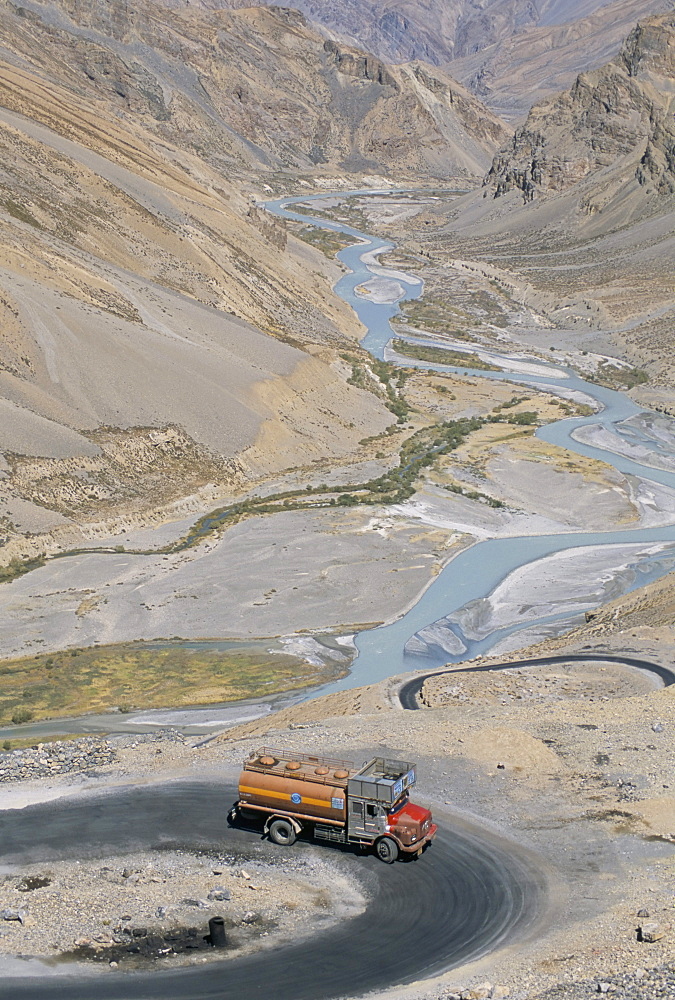 Truck climbing Lachalang Pass, 5065m, out of valley of Zanskar River, Leh-Manali highway, Ladakh, India, Asia