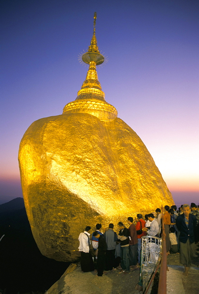 Balanced rock covered in gold leaf, major Buddhist stupa and pilgrim site, Kyaiktiyo, Myanmar (Burma), Asia