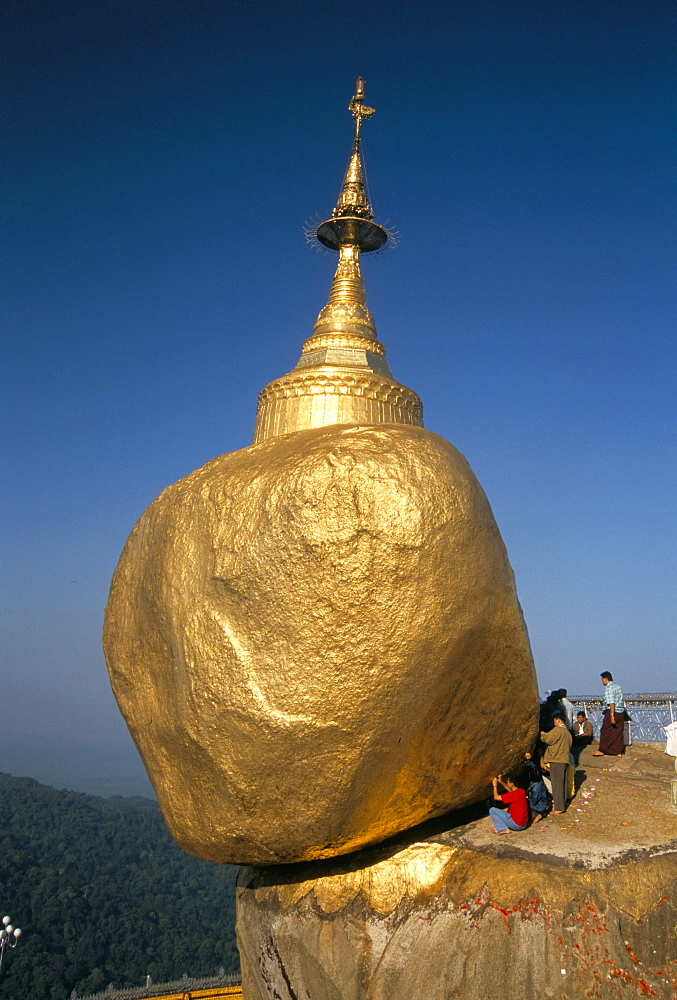 Balanced rock covered in gold leaf, major Buddhist stupa and pilgrim site, Kyaiktiyo, Myanmar (Burma), Asia