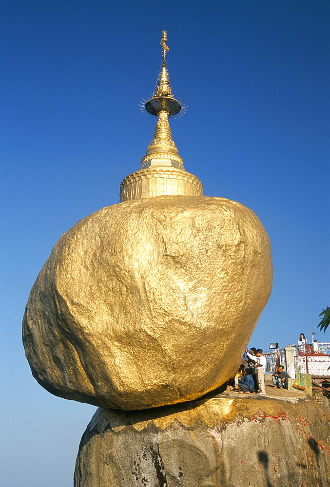 Balanced rock covered in gold leaf, major Buddhist stupa and pilgrim site, Kyaiktiyo, Myanmar (Burma), Asia