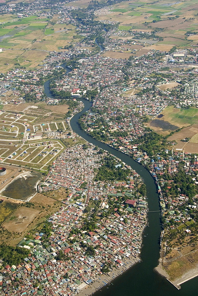 Aerial view of dormitory township on river into south end of Manila Bay, Manila, Philippines, Southeast Asia, Asia