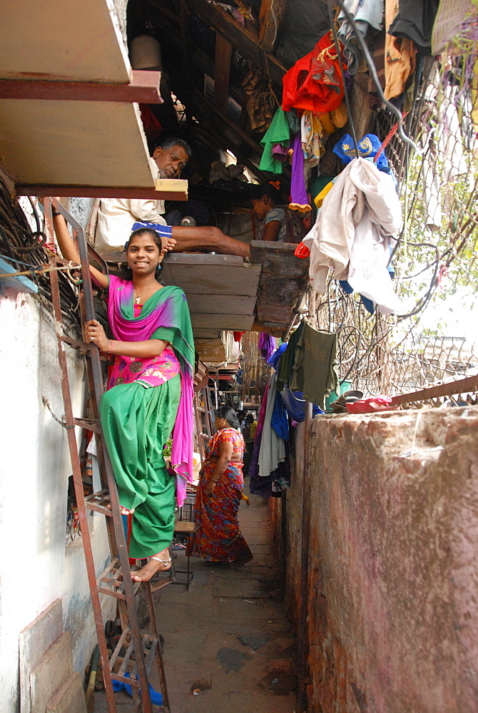 Narrow street and 2-layer houses, Colaba fishing village, southern end of Mumbai city, Maharashtra, India, Asia