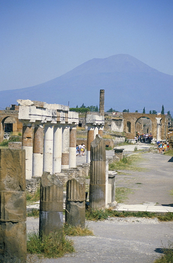 Vesuvius volcano from ruins of Forum buildings in Roman town, Pompeii, Campania, Italy, Europe