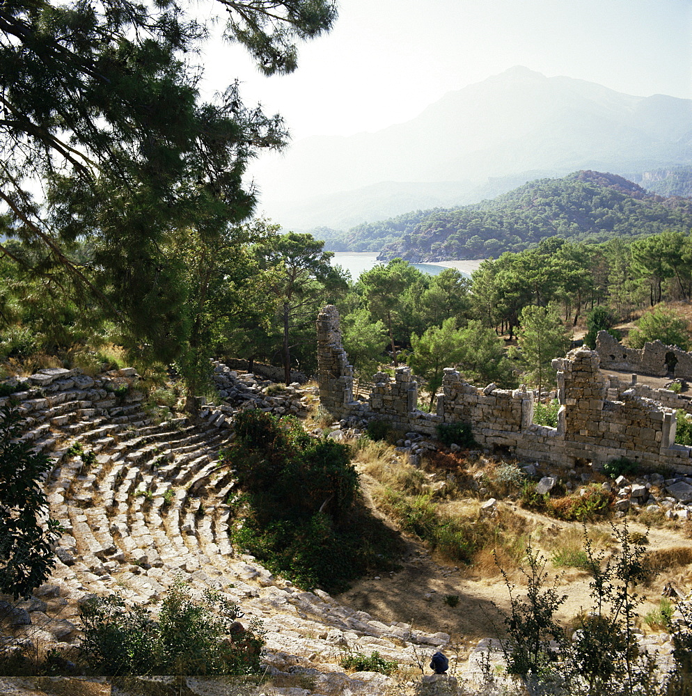 The ruins of Phaselis, with the Tehtel mountain in the background, Anatolia, Turkey, Asia Minor, Eurasia