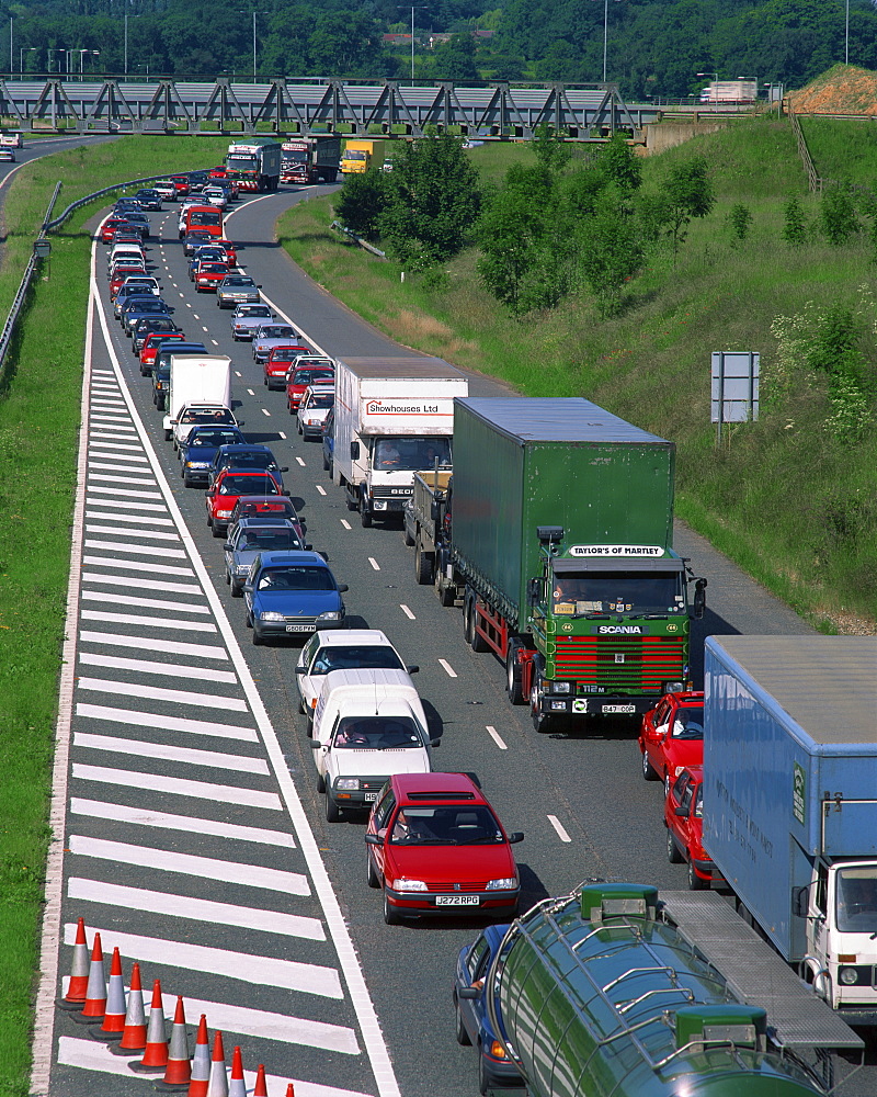 Lorries, vans and cars in a traffic jam on a road in England, United Kingdom, Europe