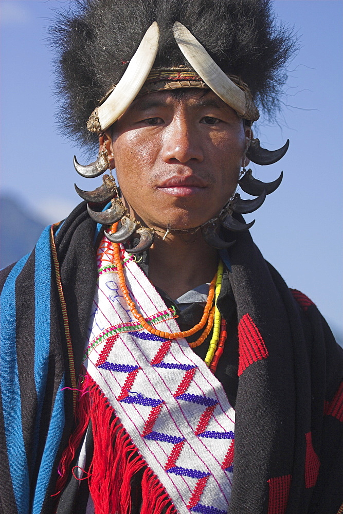 Naga New Year Festival, Naga man wearing headdress made of woven cane decorated with wild boar teeth and bear fur, Lahe village, Sagaing Division, Myanmar (Burma), Asia