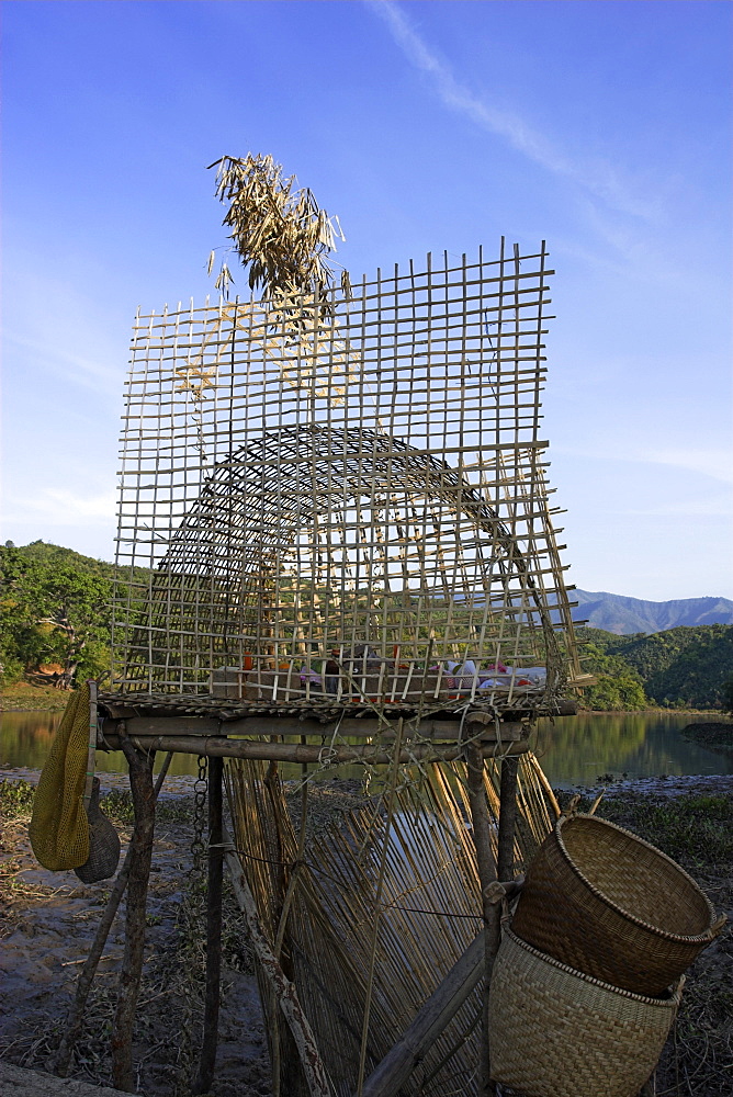 Shrine at edge of lake, near Wan Sai village (Aku tribe), to help bring good luck when fishing, Kengtung (Kyaing Tong), Shan State, Myanmar (Burma), Asia