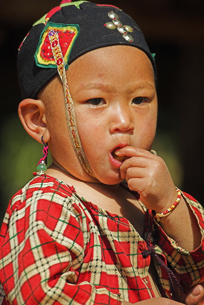 Wan Sai village (Aku tribe) Aku baby girl, Kengtung (Kyaing Tong), Shan State, Myanmar (Burma), Asia