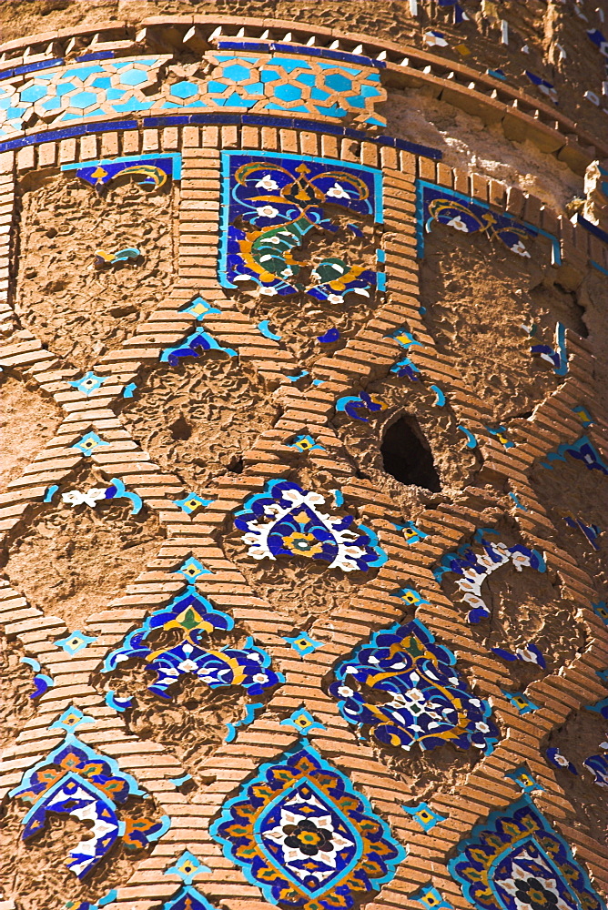 Tilework and mortar hole on minaret beside Gaur Sahd's mausoleum, The Mousallah Complex, Herat, Herat Province, Afghanistan, Asia