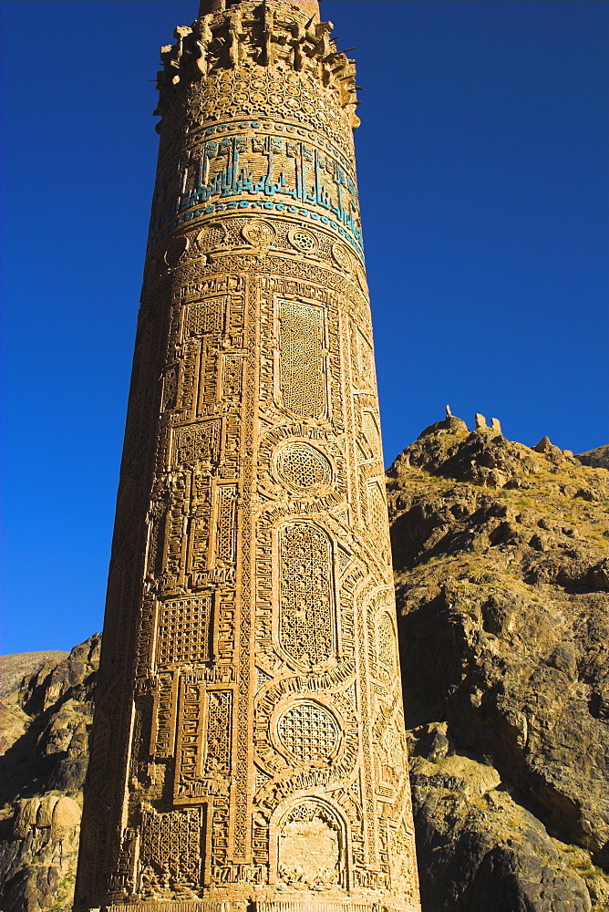 Detail of the 12th century Minaret of Jam, including Kufic inscription in turquoise glazed tiles, Quasr Zarafshan in background, UNESCO World Heritage Site, Ghor (Ghur, Ghowr) Province, Afghanistan, Asia