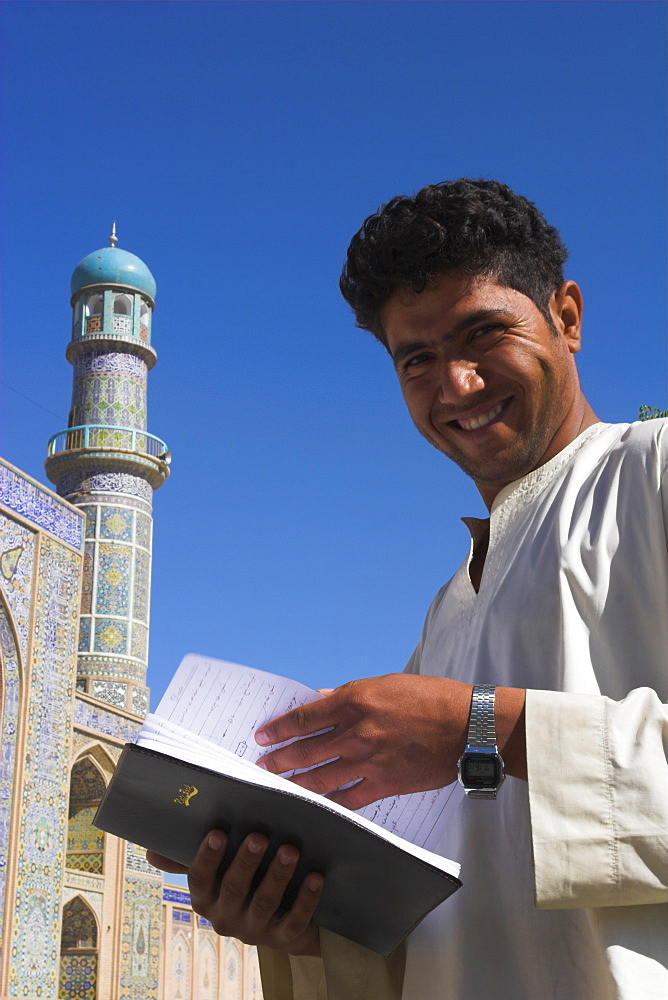 Local man in front of Friday Mosque or Masjet-e Jam, Herat, Afghanistan, Asia