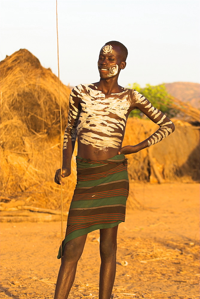 Karo man with body painting, made from mixing animal pigments with clay, Kolcho village, Lower Omo Valley, Ethiopia, Africa