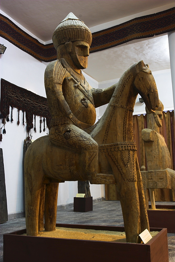 Famous Nuristan wooden statue of king on horse, Kabul Museum, Kabul, Afghanistan, Asia