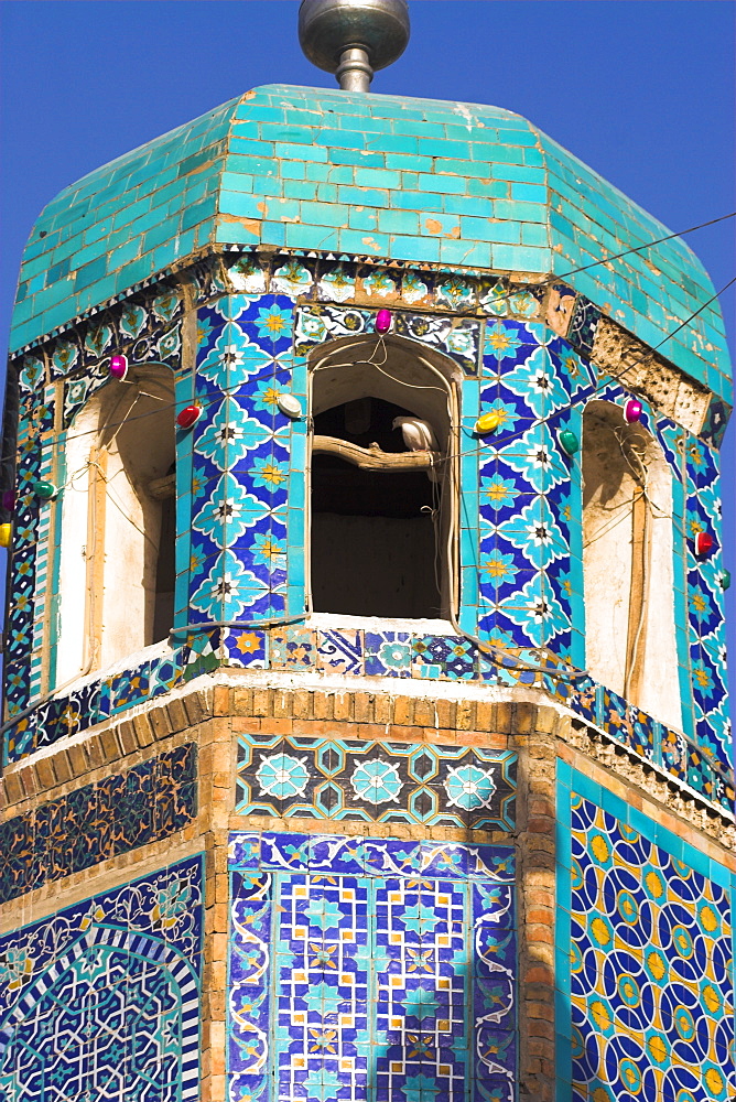 Famous white pigeon in minaret, Shrine of Hazrat Ali, who was assassinated in 661, Mazar-I-Sharif, Afghanistan, Asia