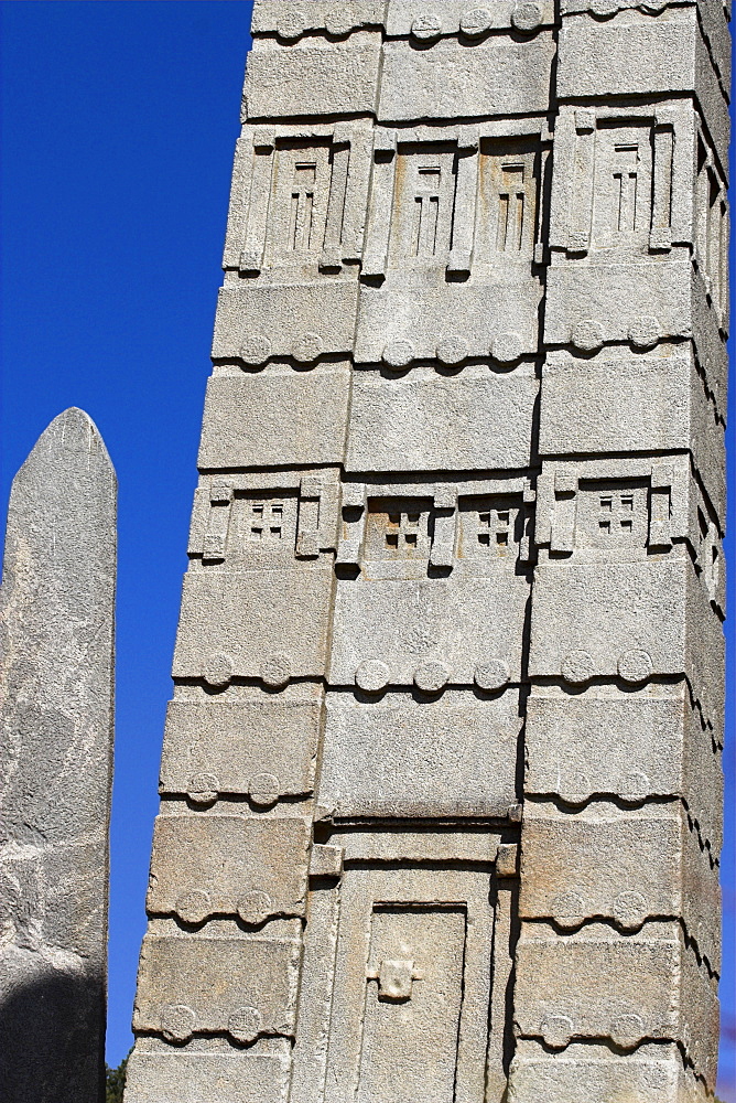 Intricate carvings and false door at the base of King Ezana's stele, the biggest stelae still standing, 24m high, Northern Stelae Park, Aksum, Ethiopia, Africa