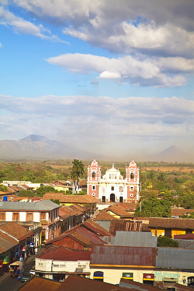 View from Leon Cathedral looking across rooftops towards Iglesia Dulce Nombre de Jesus El Calvario, Leon, Nicaragua, Central America