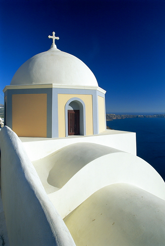 Domed church and view out to sea, Fira, Santorini, Greece 