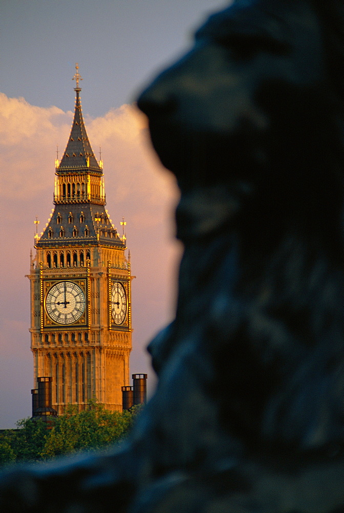 Big Ben and lion statue on Trafalgar Square, London, England 