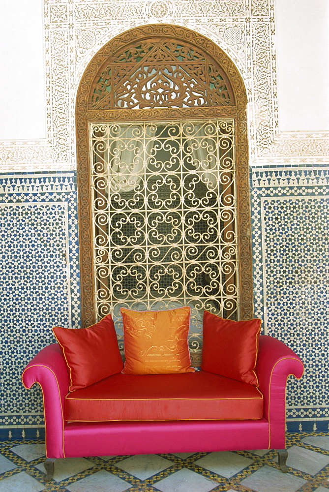 Sofa in courtyard of Riad Enija, The Medina, Marrakech, Morocco, North Africa, Africa