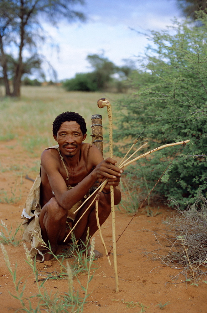 Bushman with bow and arrows, Intu Afrika game reserve, Namibia, Africa