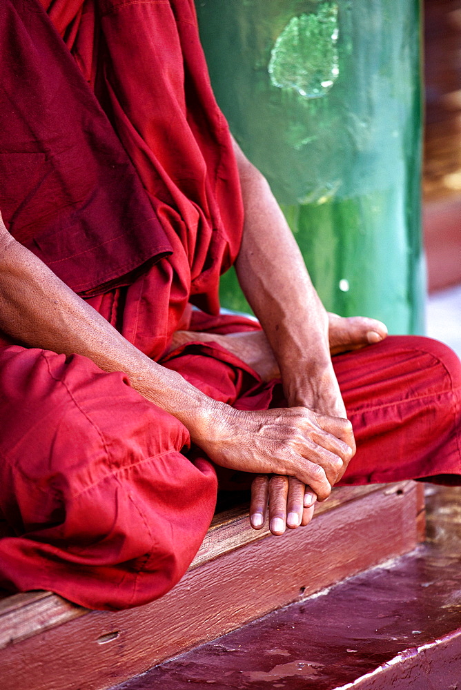 Hands of Buddhist monk at Shwedagon Paya (Shwedagon Pagoda), Yangon (Rangoon), Myanmar (Burma), Asia