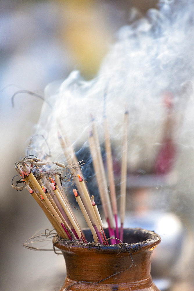 Incense burning at Shwedagon Paya (Pagoda), Yangon (Rangoon), Myanmar (Burma), Asia