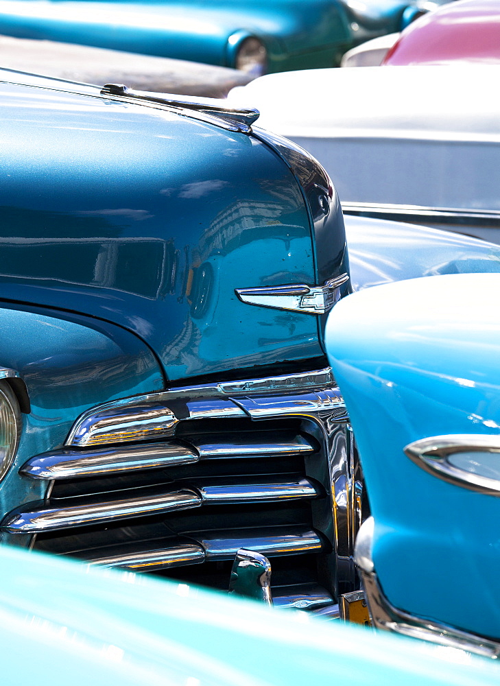 Vintage American cars parked on a street in Havana Centro, Havana, Cuba, West Indies, Central America