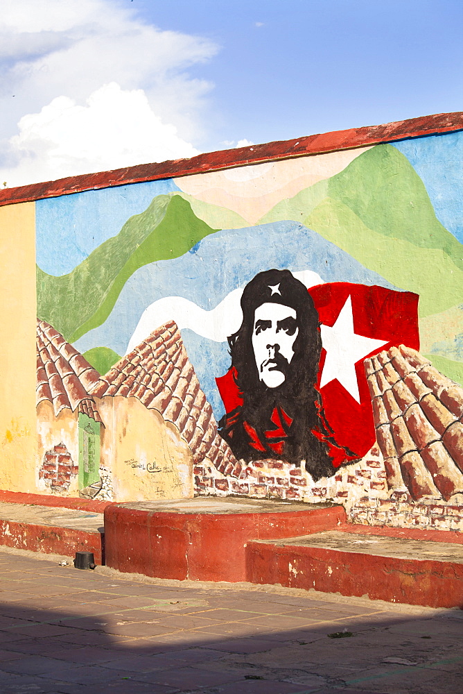 Mural of Che Guevara painted on a wall in a local school, Trinidad, Cuba