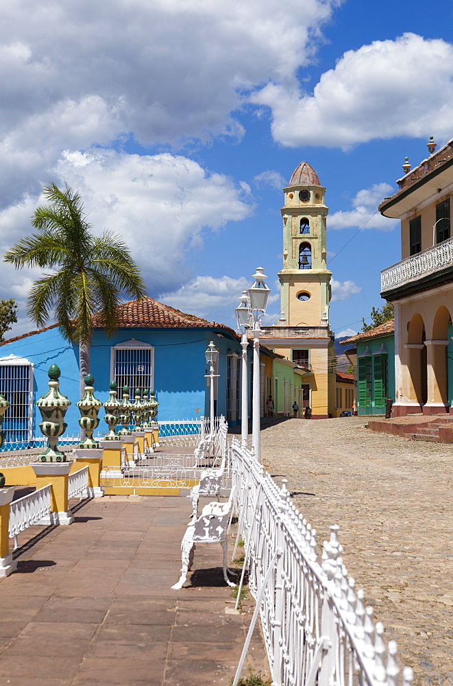 View across Plaza Mayor towards Museo Romantico and the belltower of The Convento de San Francisco de Asis, Trinidad, UNESCO World Heritage Site, Cuba, West Indies, Central America 