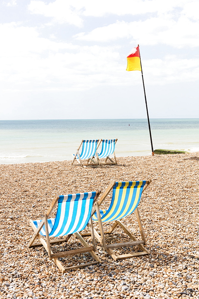 Deckchairs on the beach, Brighton, East Sussex, England, United Kingdom, Europe