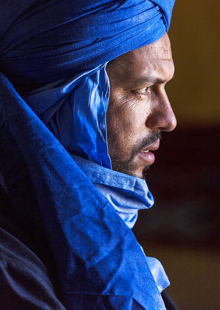 Portrait of Berber man wearing traditional blue robes, village of Hassi Labiad, near Merzouga, Morocco, North Africa, Africa