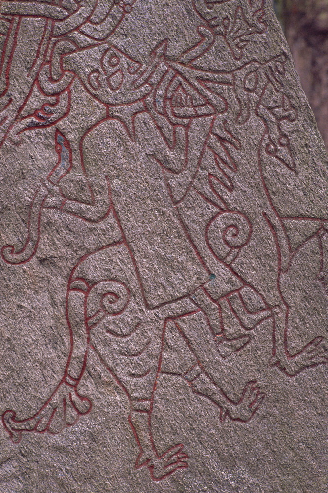 Witch from Icelandic Edda riding a wolf, detail of standing stone circa 1000AD, Lund, Sweden, Scandinavia, Europe