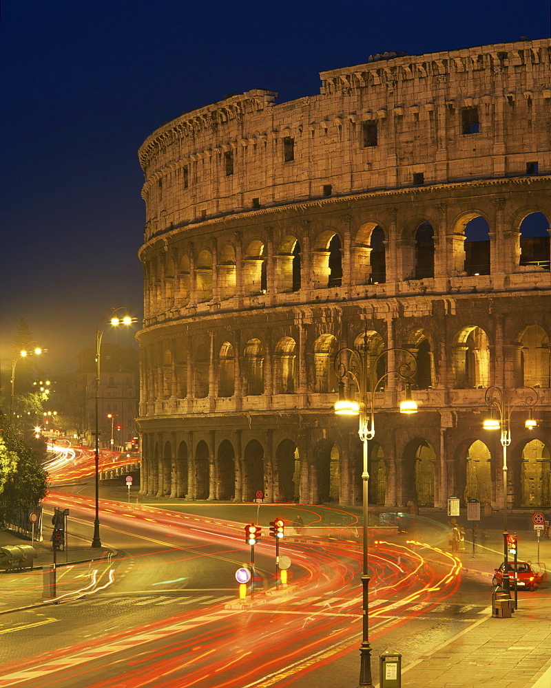 The Colosseum illuminated at night in Rome, Lazio, Italy, Europe