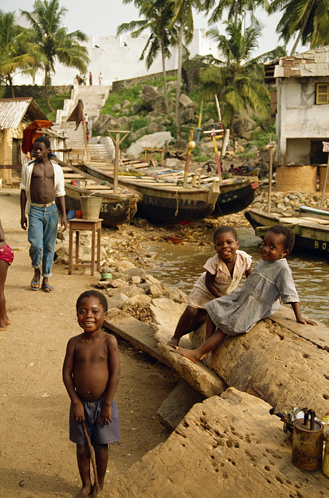 Children playing by harbour, Dixcove, Ghana, West Africa, Africa