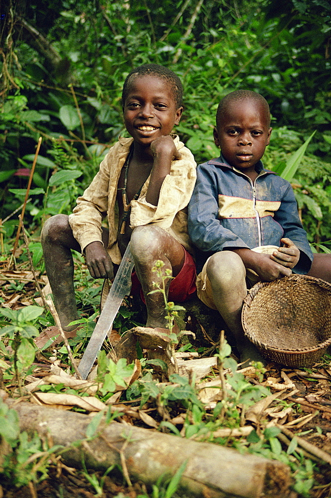 Two boys with machete, Cameroon, Africa